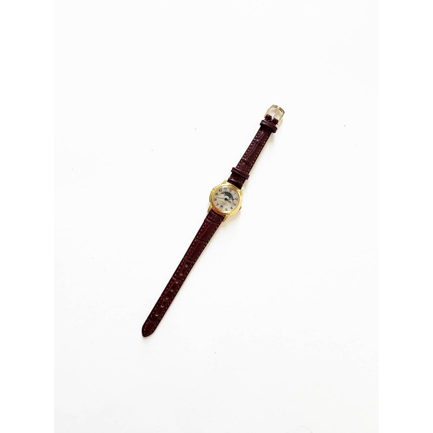 Vintage Leather Watch with Brown Band and Gold Details and Sky no