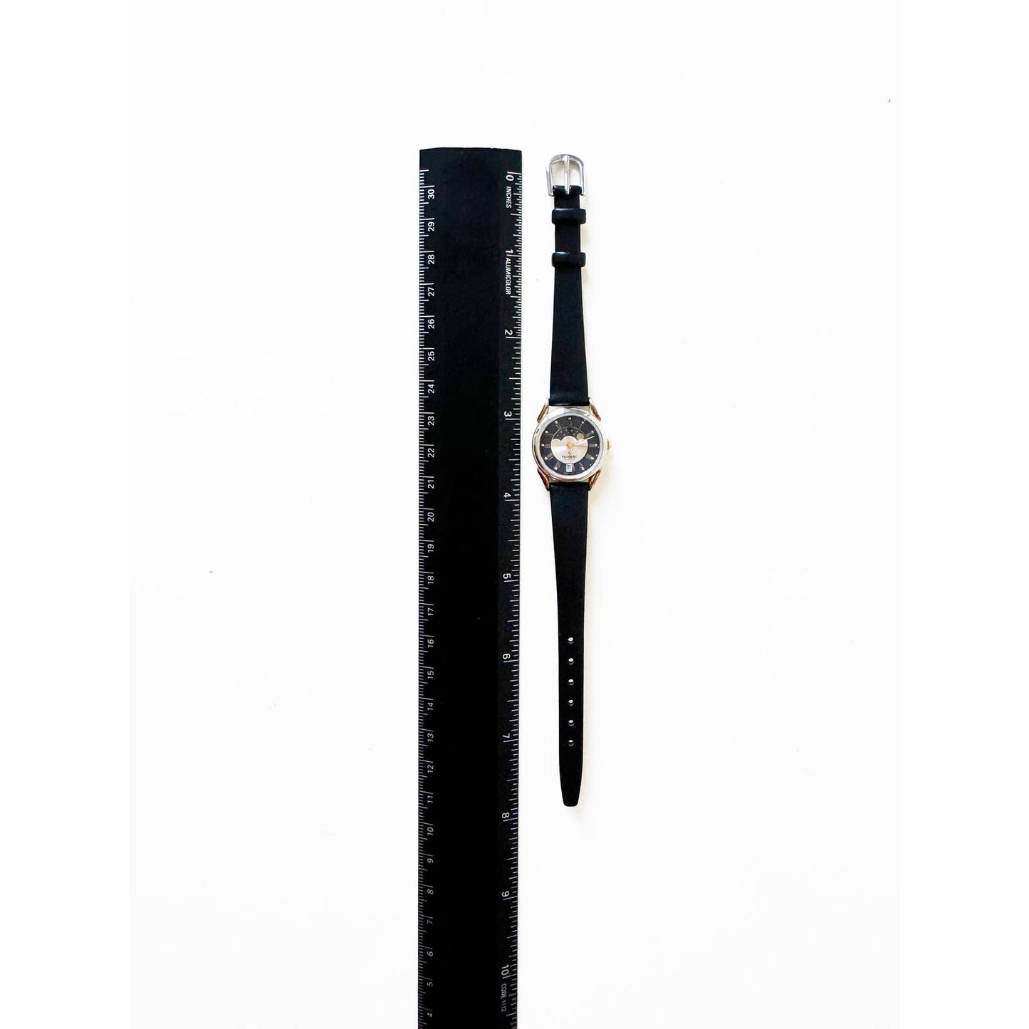 Vintage Leather Watch with Black Band and Silver Details and Sky | Peugeot