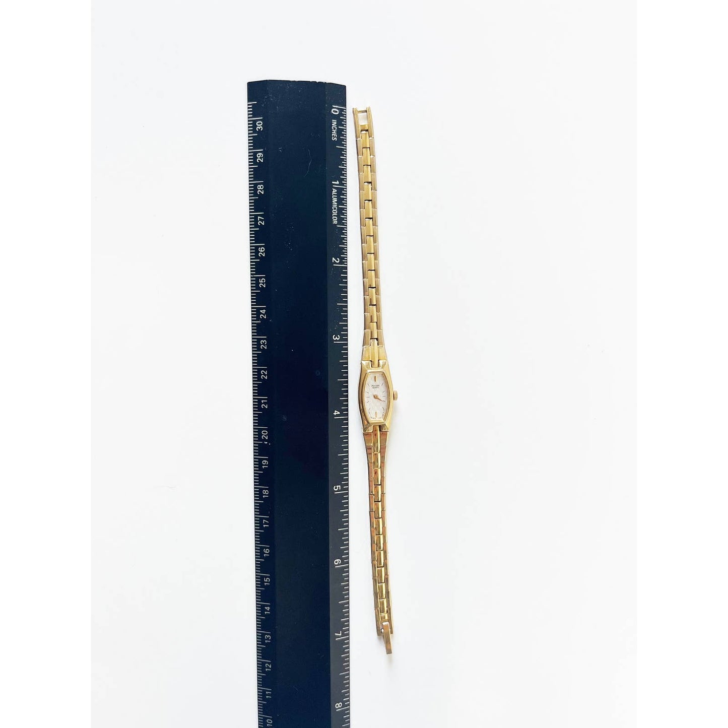 Vintage 90s Small Gold Watch with Skinny Face | Pulsar