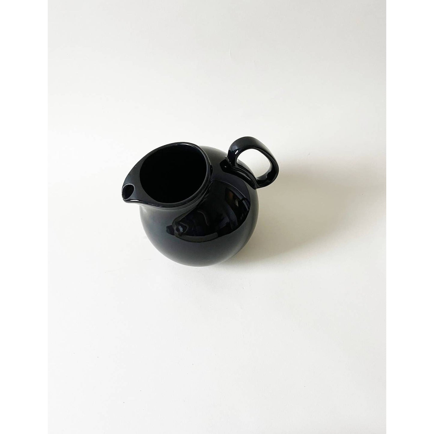 Vintage Circular Ceramic Black Pitcher
