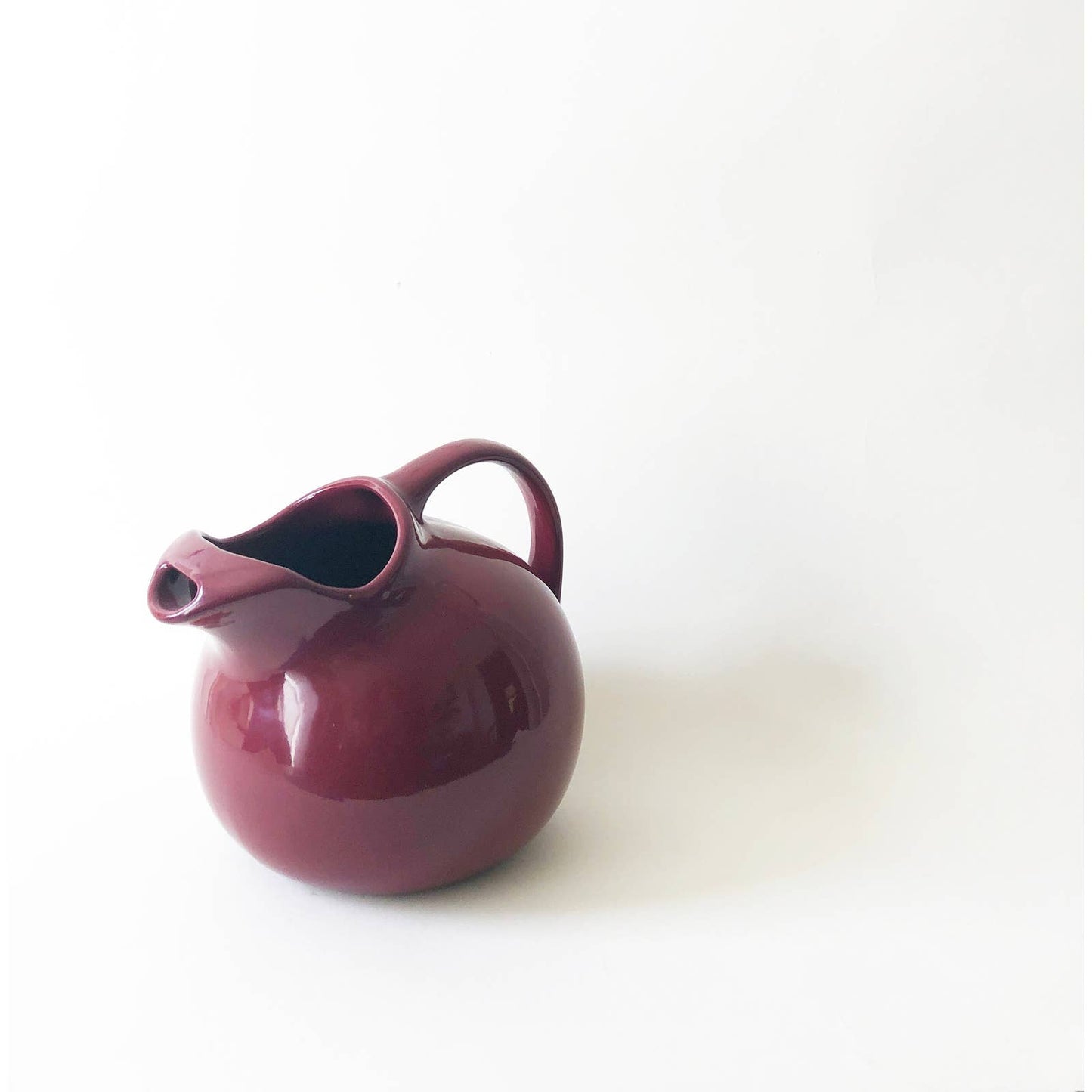 Vintage Circular Ceramic Maroon Pitcher