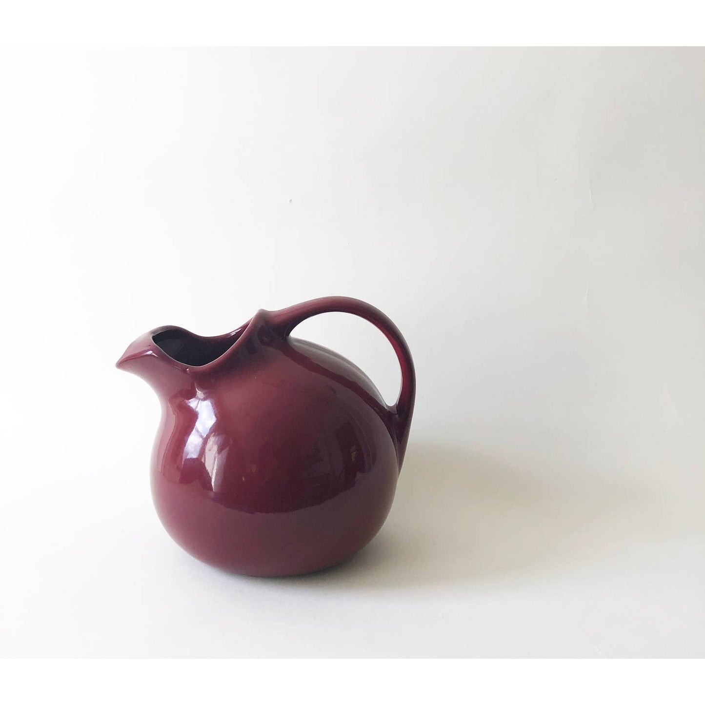 Vintage Circular Ceramic Maroon Pitcher