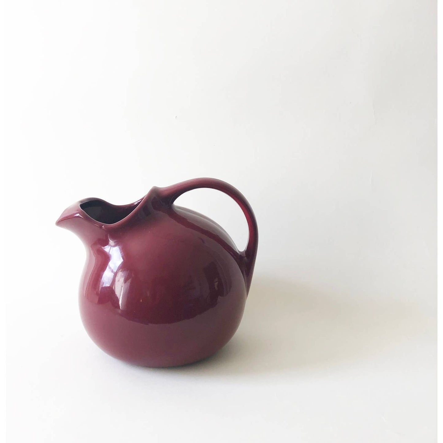 Vintage Circular Ceramic Maroon Pitcher