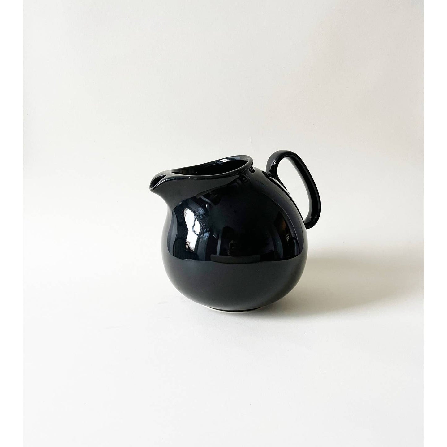 Vintage Circular Ceramic Black Pitcher