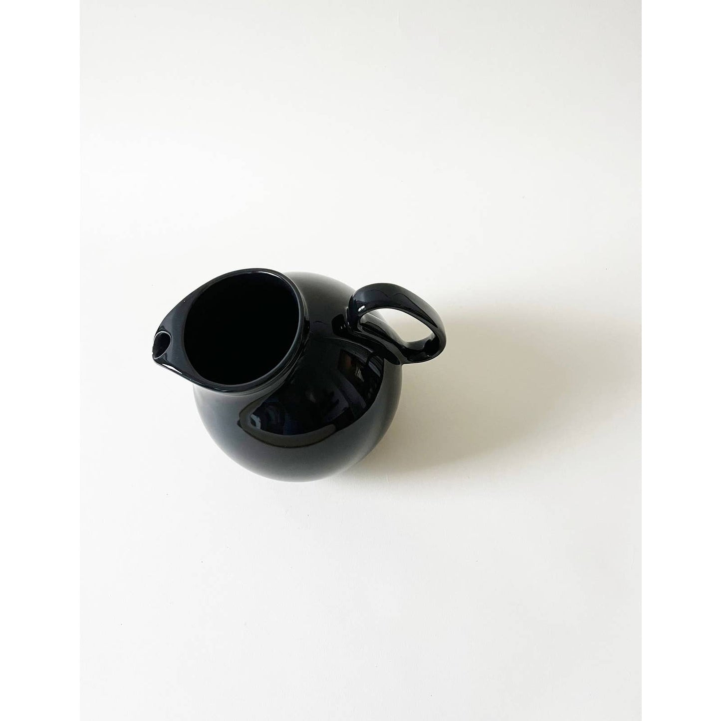 Vintage Circular Ceramic Black Pitcher