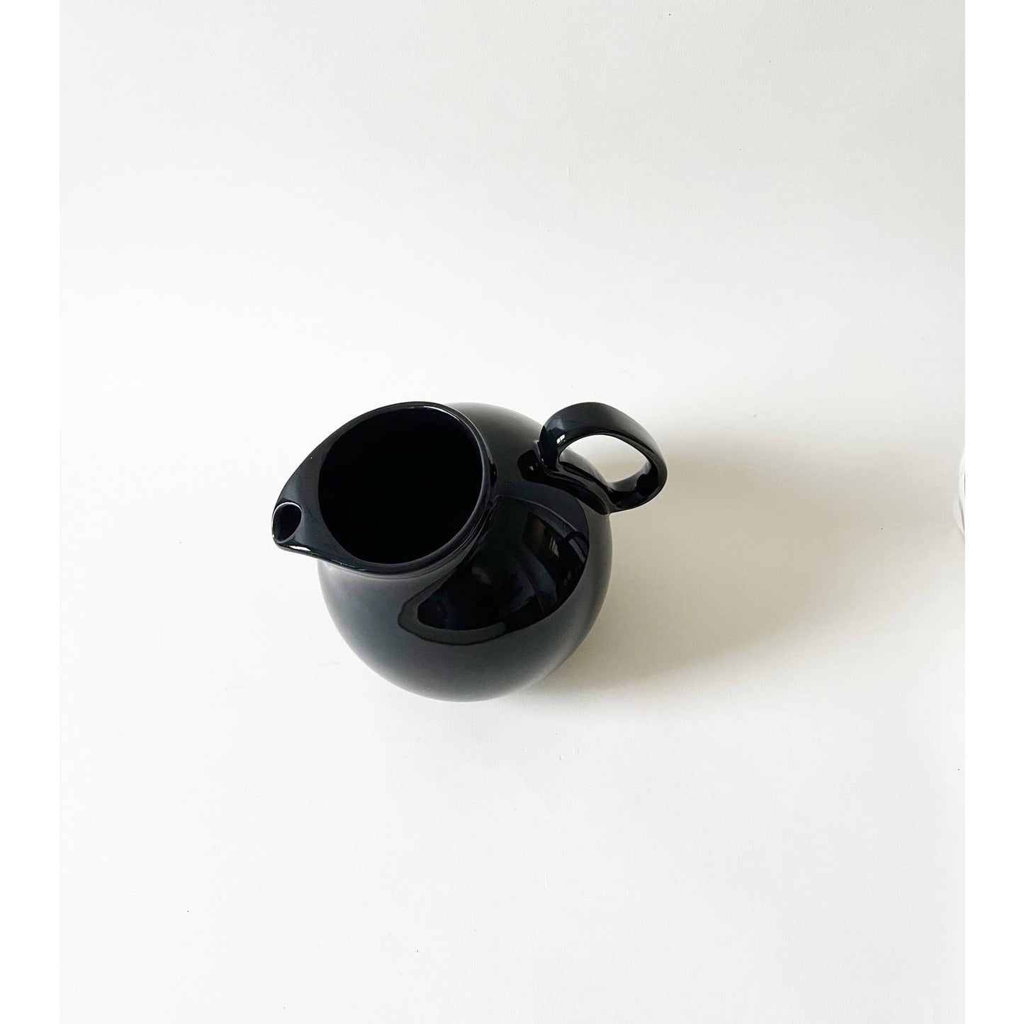 Vintage Circular Ceramic Black Pitcher