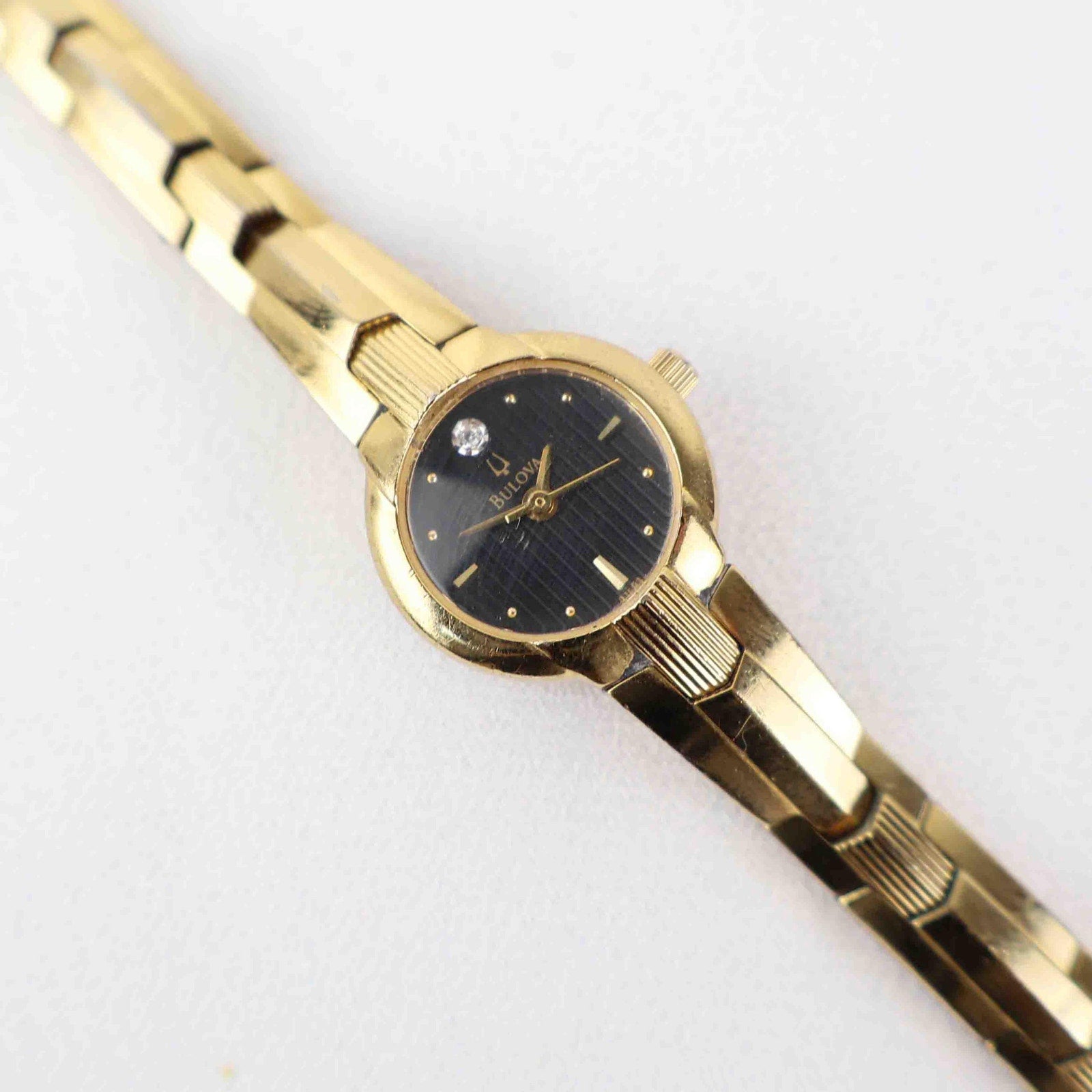 Vintage Bulova Black Face Watch – Gold Tone Bracelet (Working Battery)