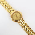 Vintage Gold Tone Pulsar Watch with a Circle Face
