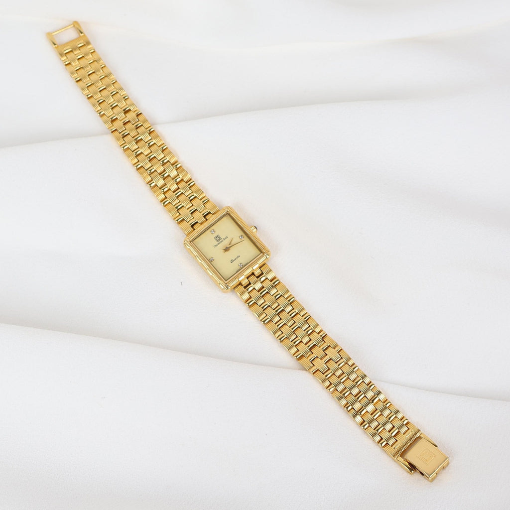 Vintage Gold Christian Gold Watch with a Rectangle Face