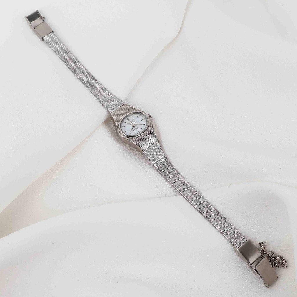 Vintage Activa Silver Tone Quartz Watch with White Face