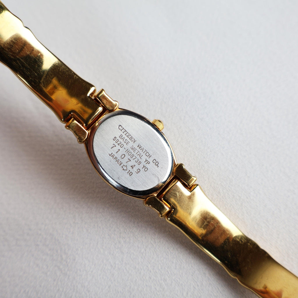 Vintage Black and Gold Citizen Cuff Watch