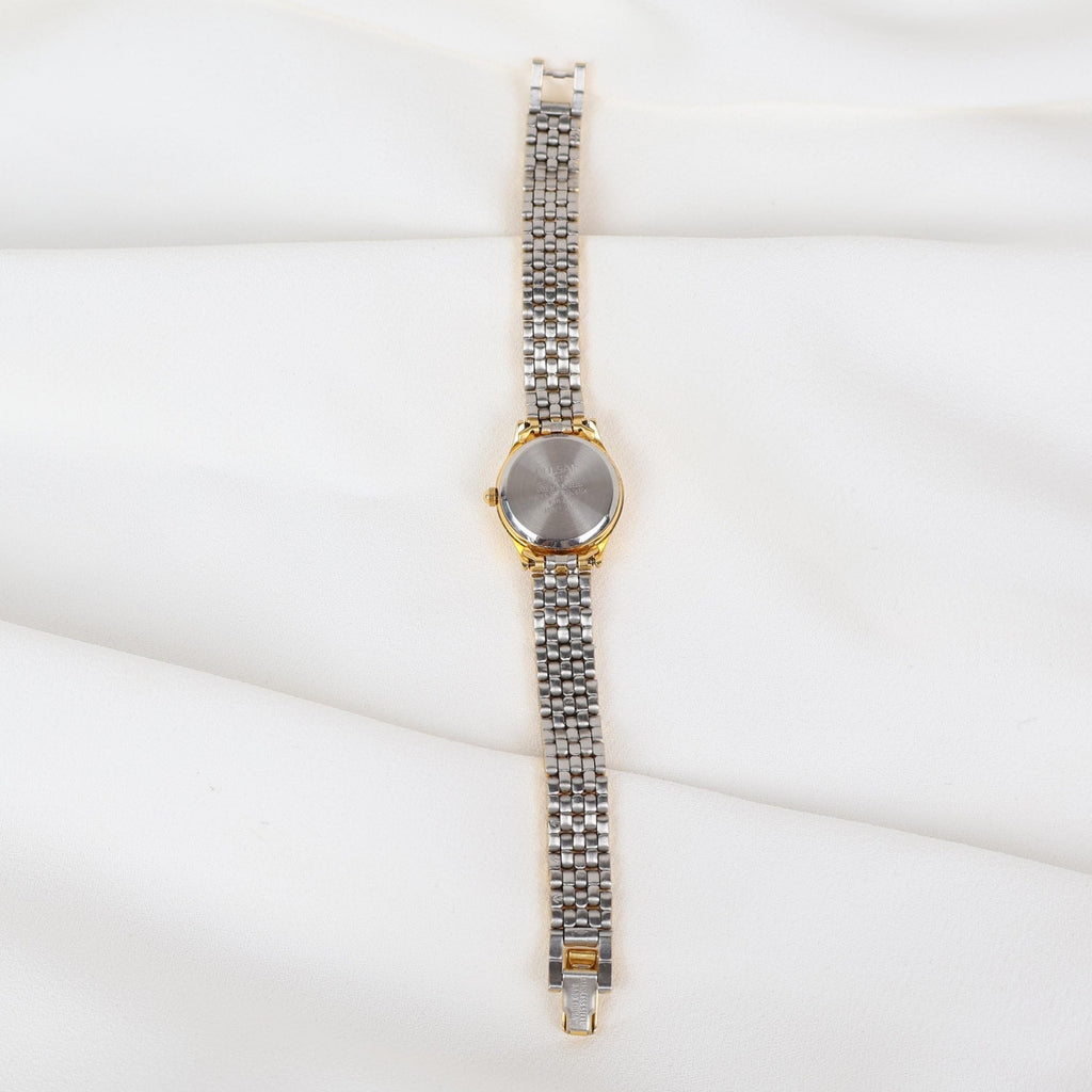 Vintage Gold Tone Pulsar Watch with a Circle Face