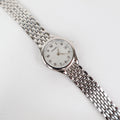 Vintage Silver Pulsar Watch with a Round Face
