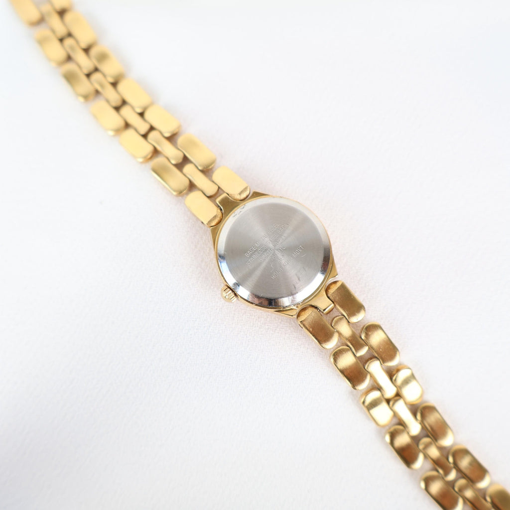 Vintage Black and Gold Worthington Watch with Round Face