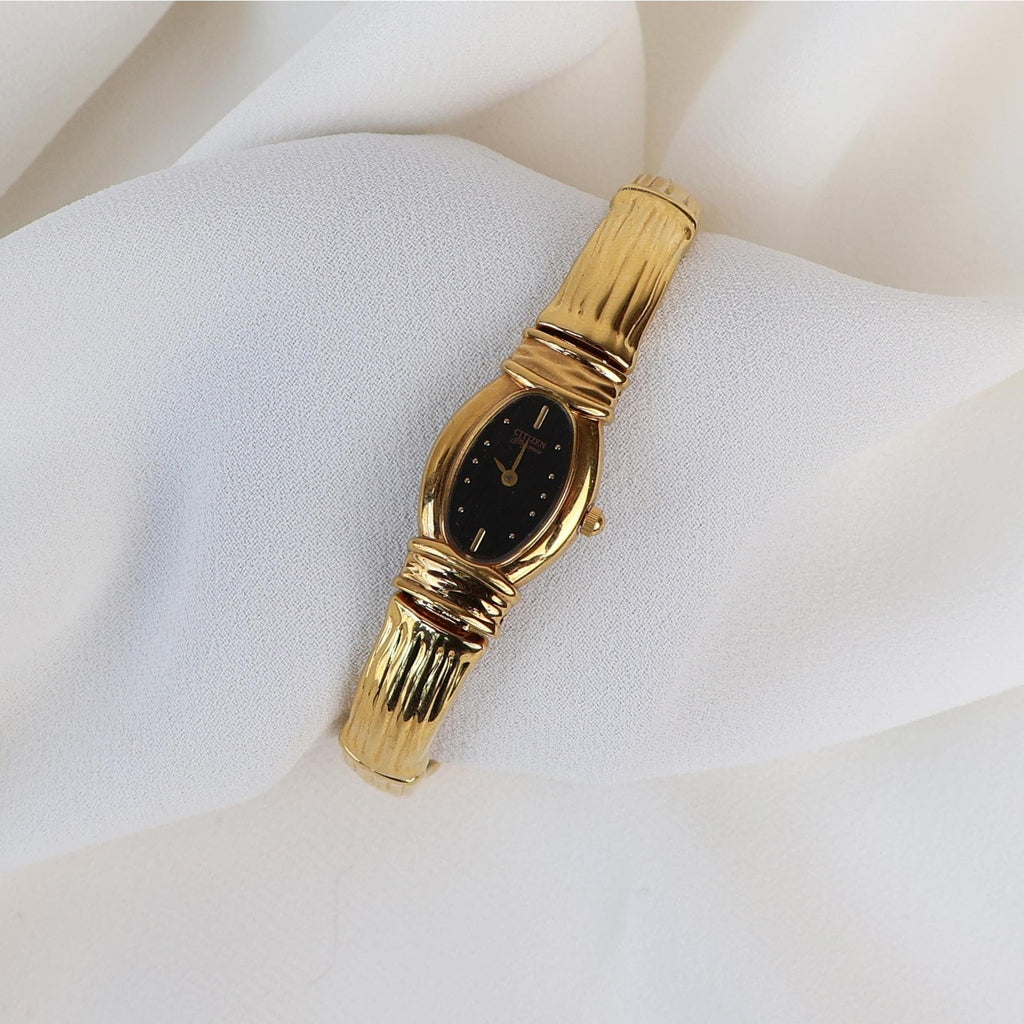 Vintage Black and Gold Citizen Cuff Watch