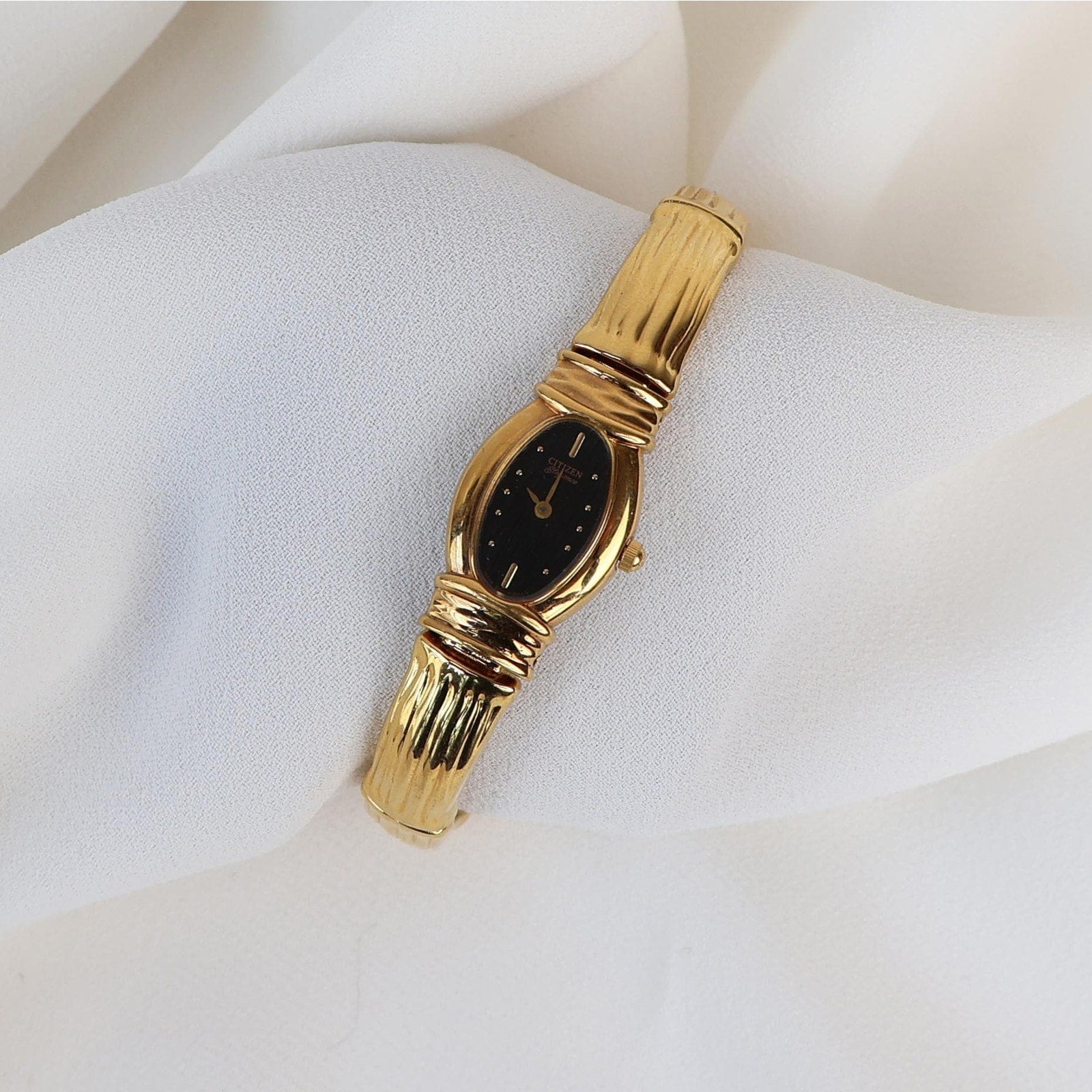 Vintage Black and Gold Citizen Cuff Watch