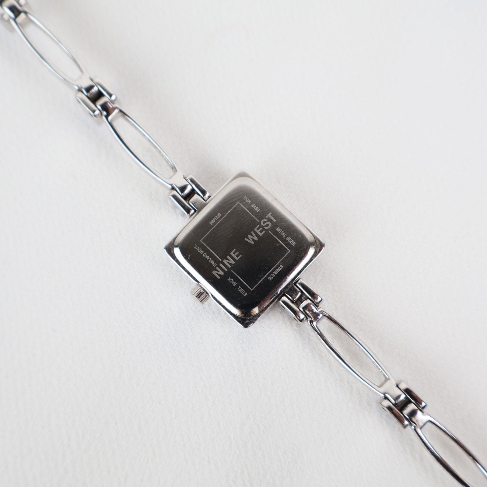 Vintage Silver Nine West Bracelet Watch with Blue Gem Embellishments