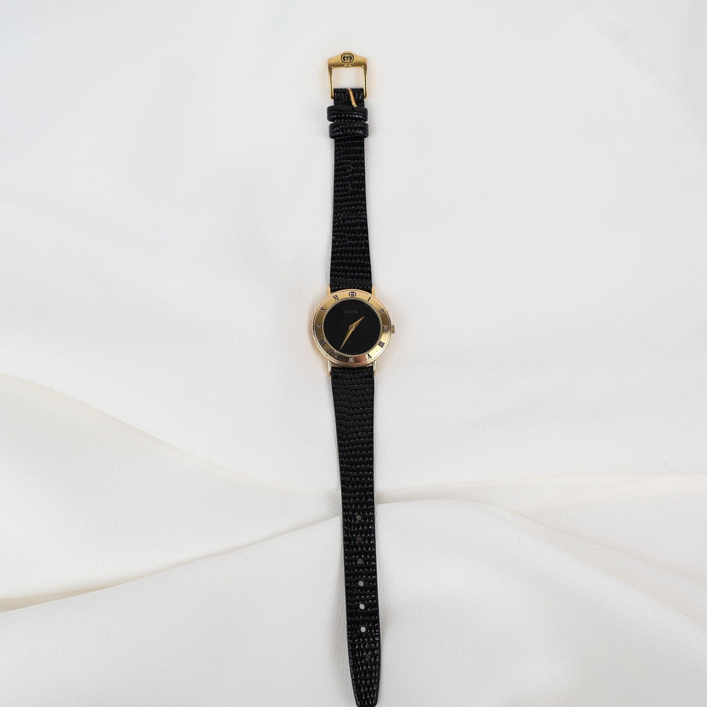 Stunning Vintage Gold Gucci Watch with Black Leather