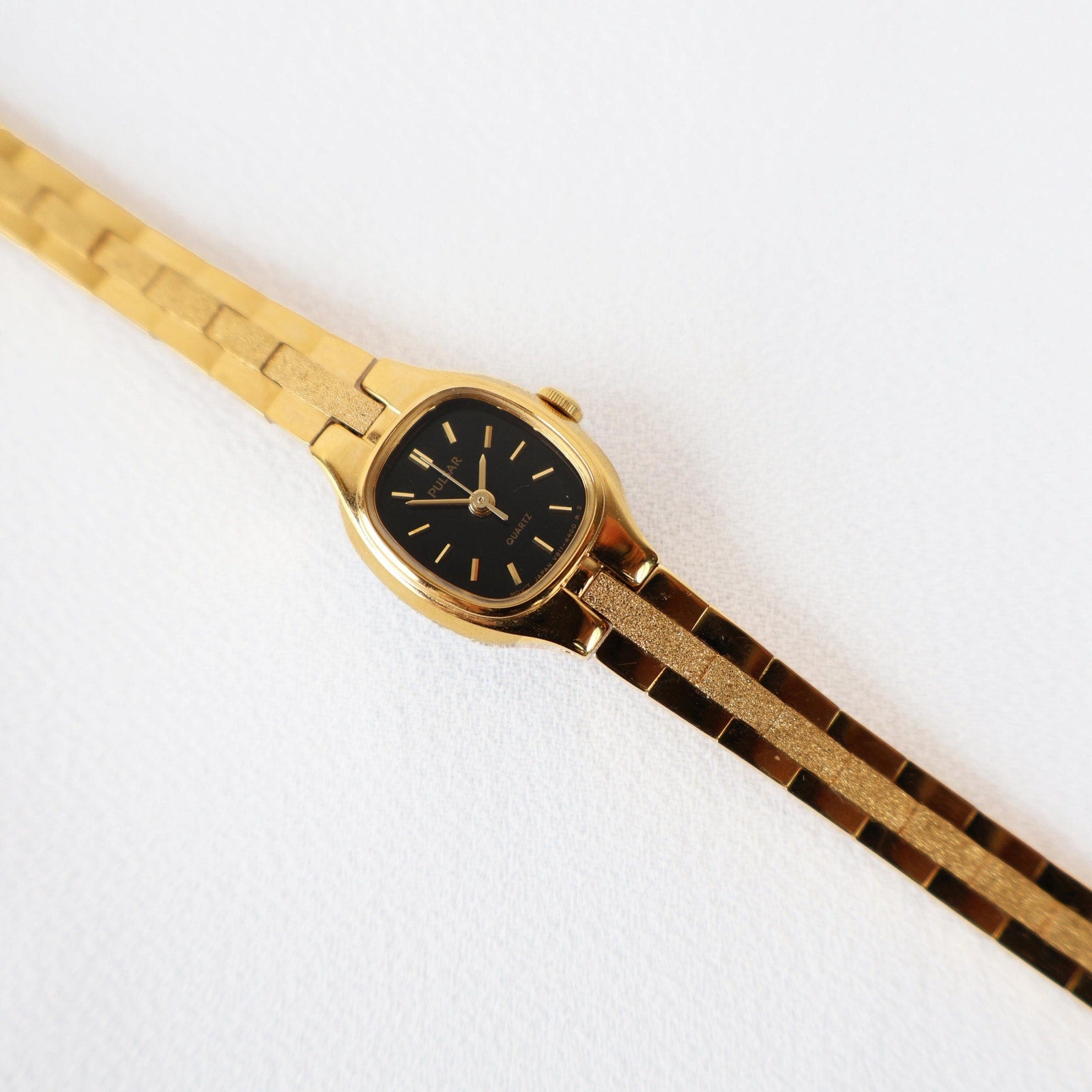 Vintage Black and Gold Pulsar Watch