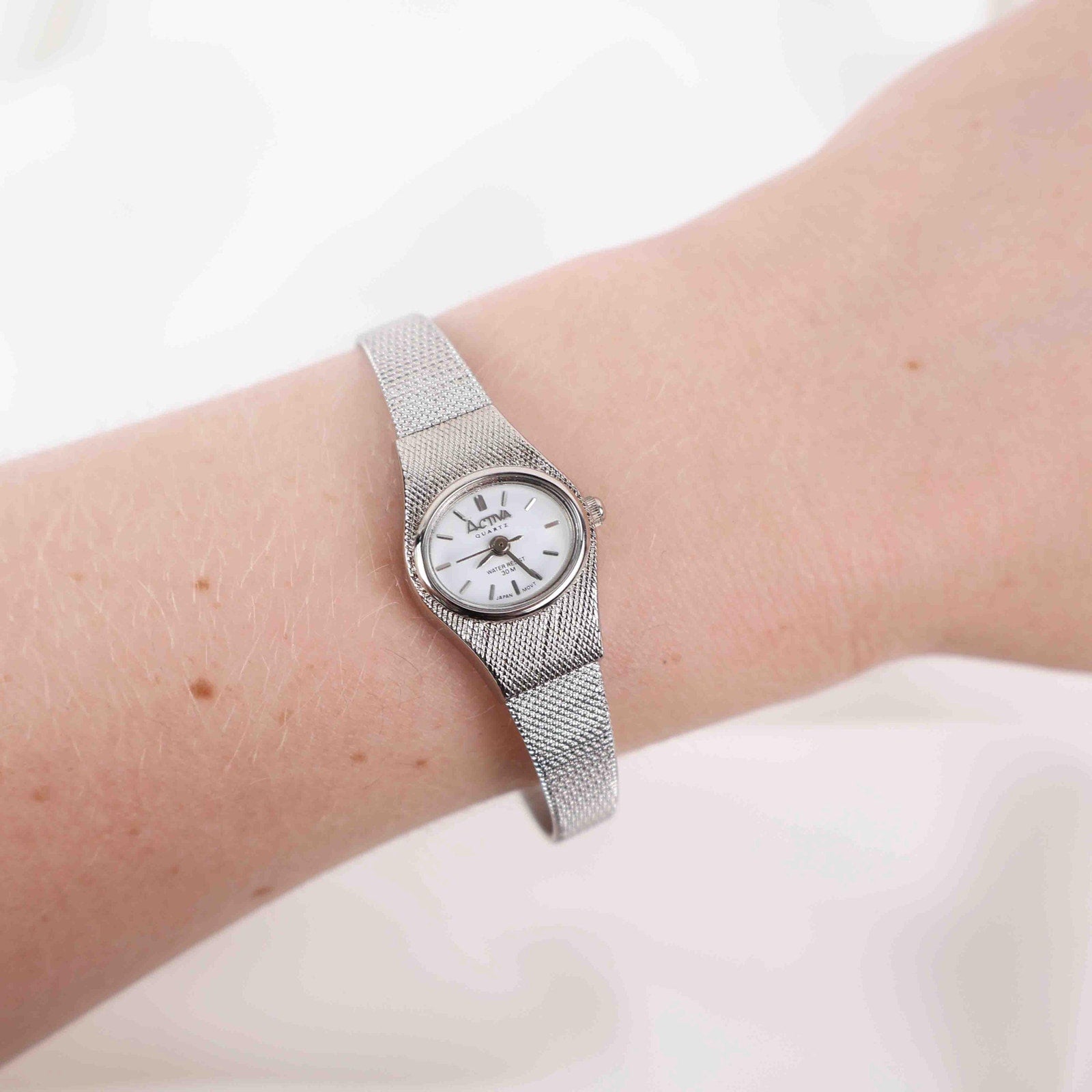 Vintage Activa Silver Tone Quartz Watch with White Face