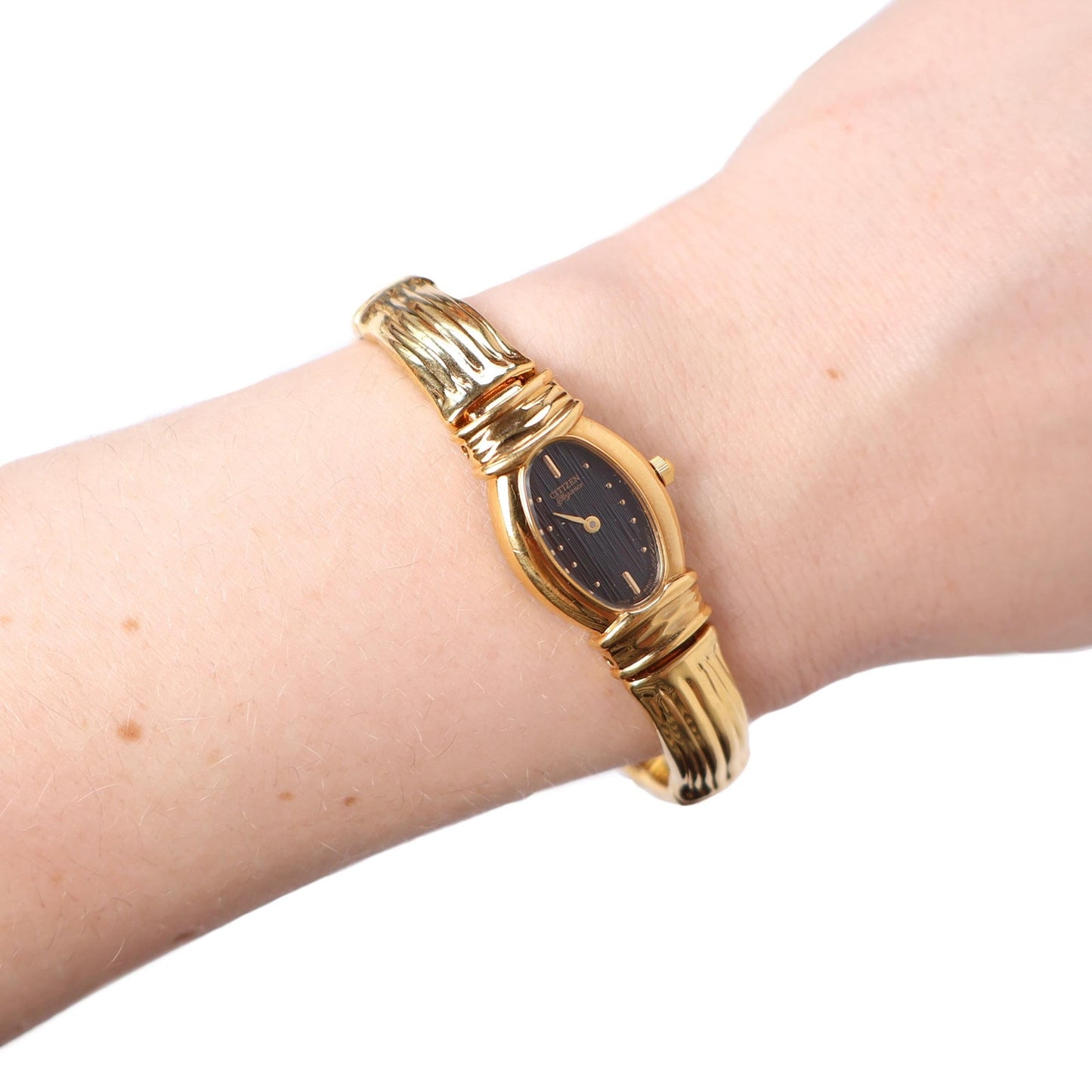 Vintage Gold Cuff Watch with Black Oval Face | CITIZEN