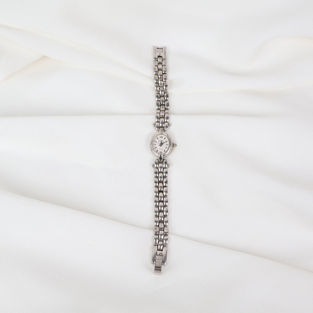 Vintage Silver Anne Klein Watch with an Oval Shaped Face