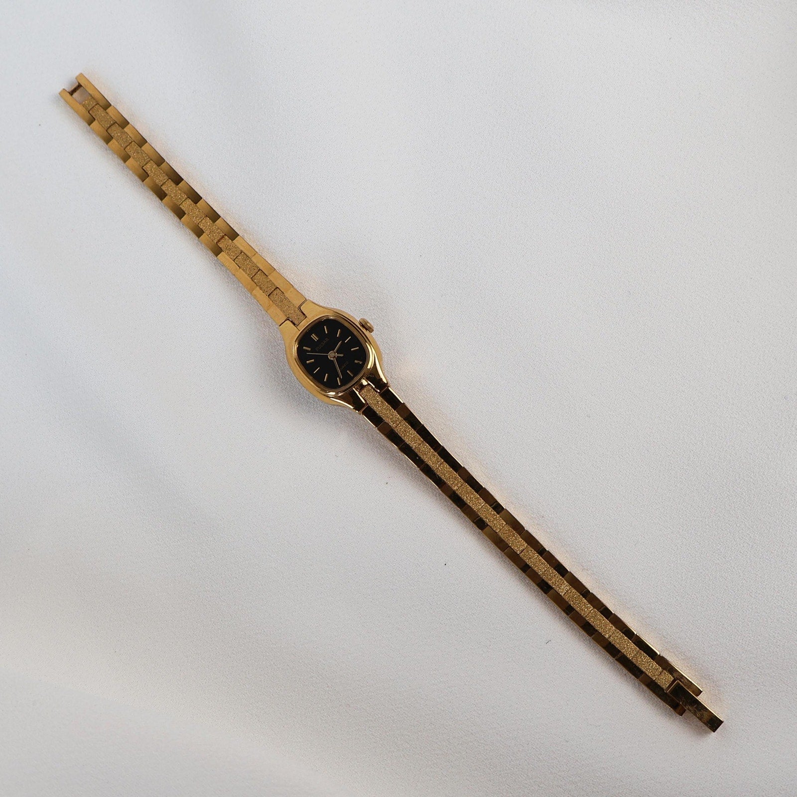 Vintage Black and Gold Pulsar Watch