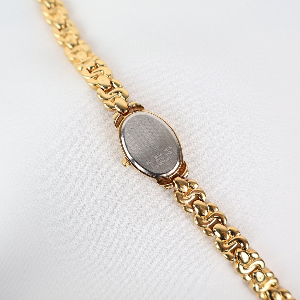 Vintage Gold Tone Caravelle by Bulova Watch with an Oval Face