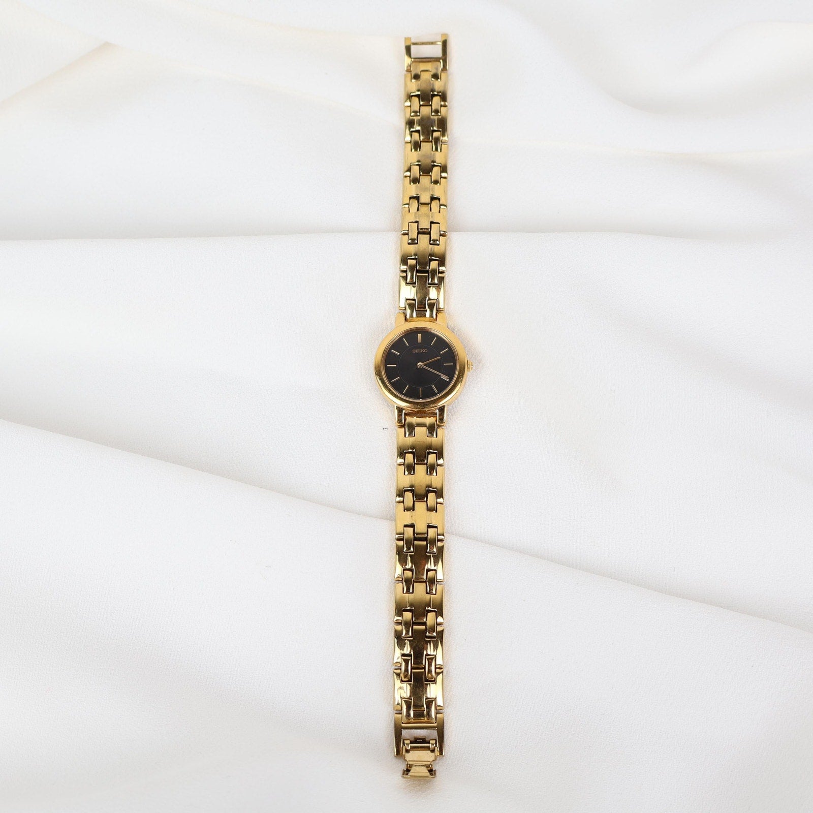 Stunning Vintage Gold Seiko Watch With a Black Round Face