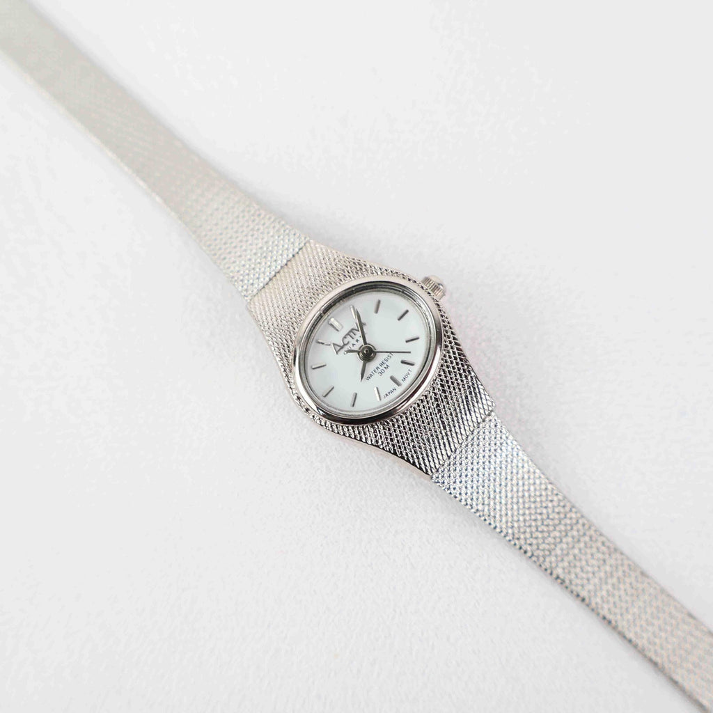 Vintage Activa Silver Tone Quartz Watch with White Face