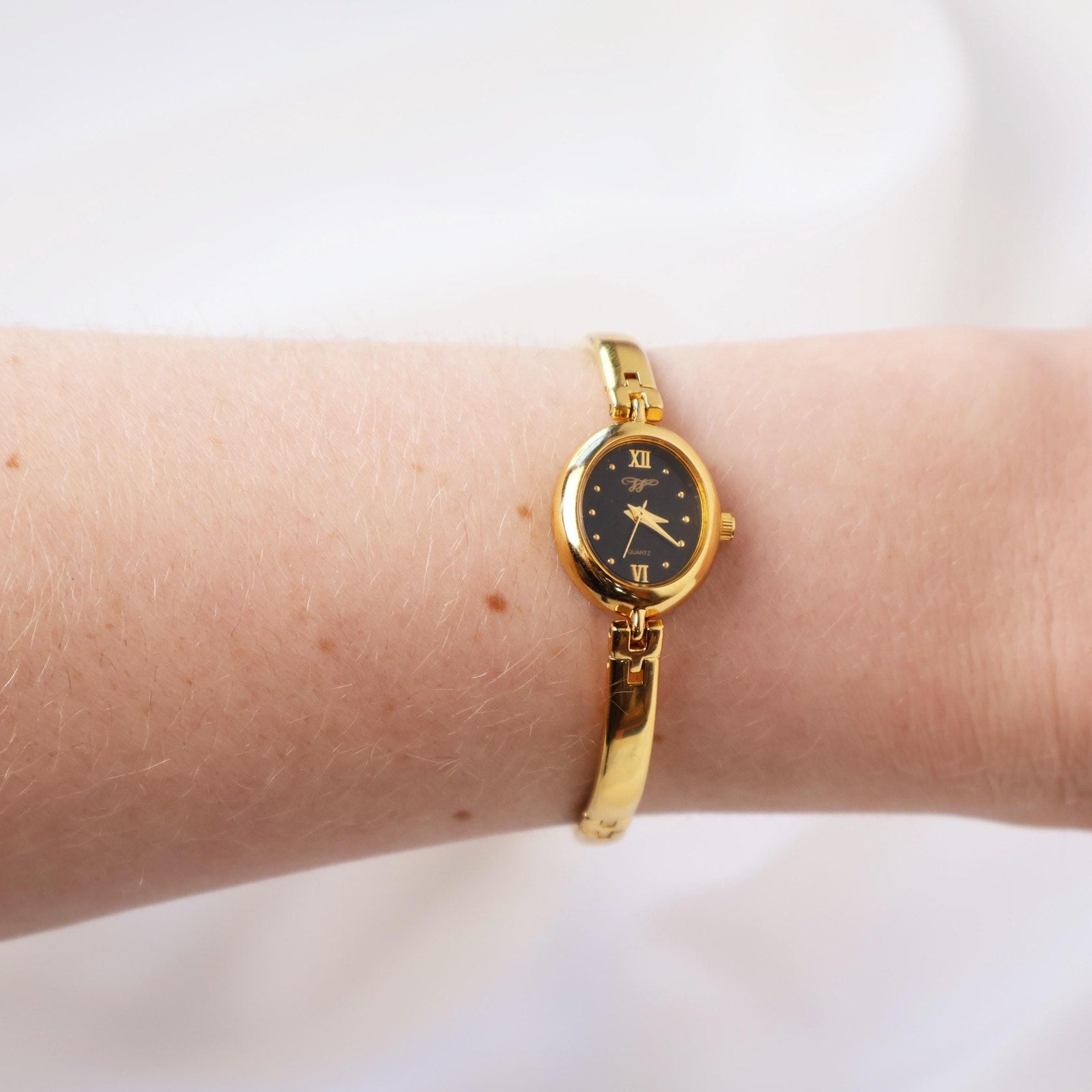Vintage Black and Gold Worthington Watch