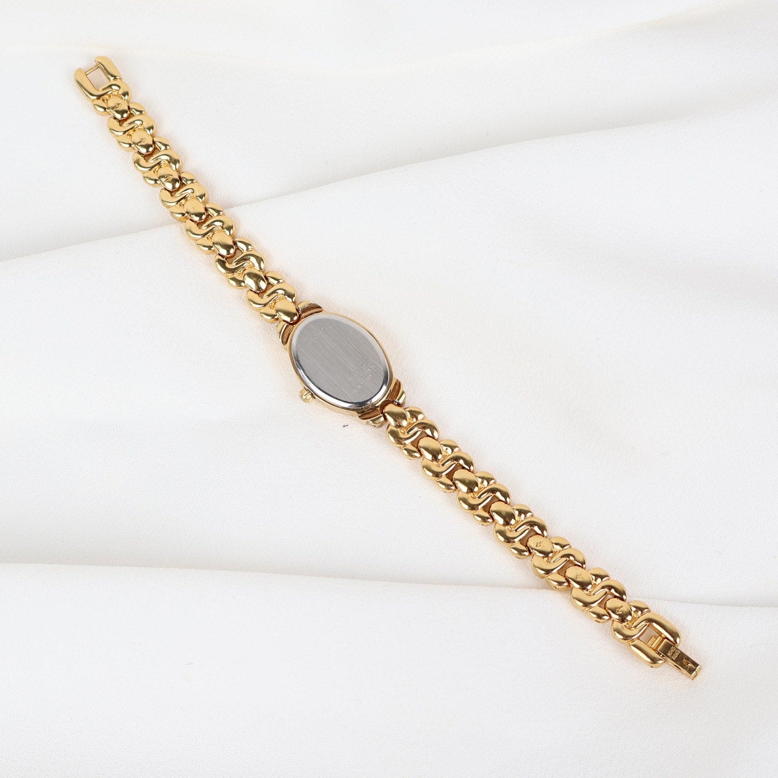 Vintage Gold Tone Caravelle by Bulova Watch with an Oval Face