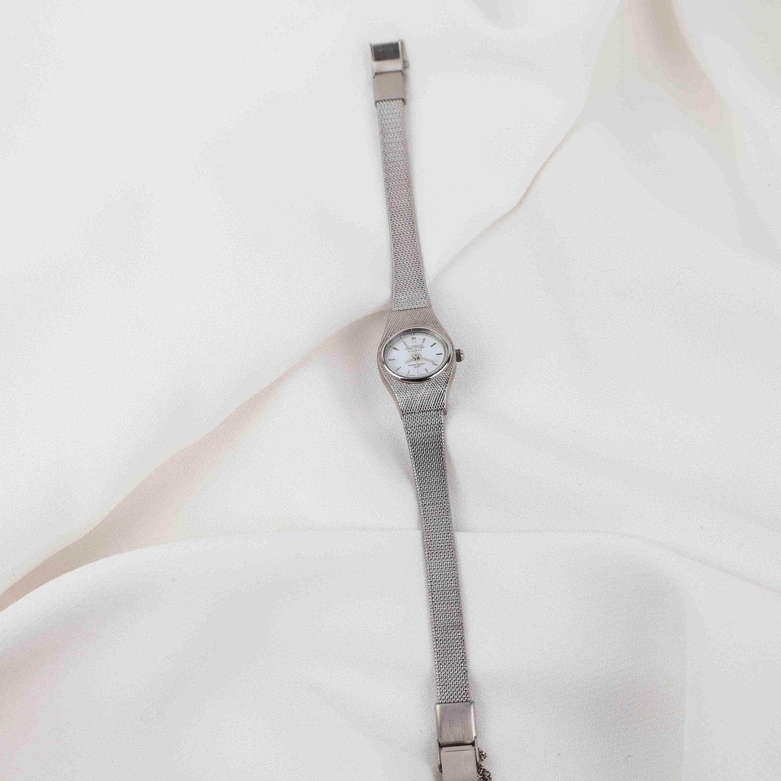 Vintage Activa Silver Tone Quartz Watch with White Face