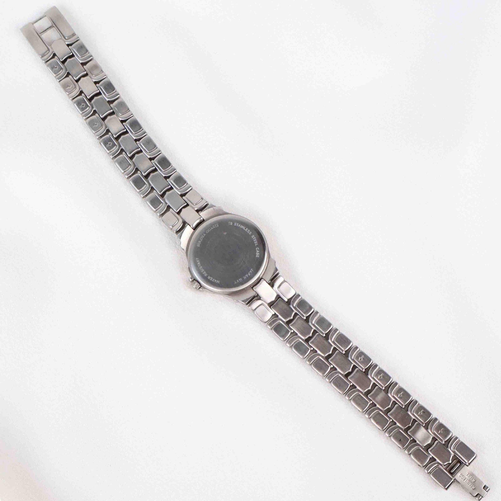 Vintage Silver Tone Bulova Watch with Round Black Watch Face