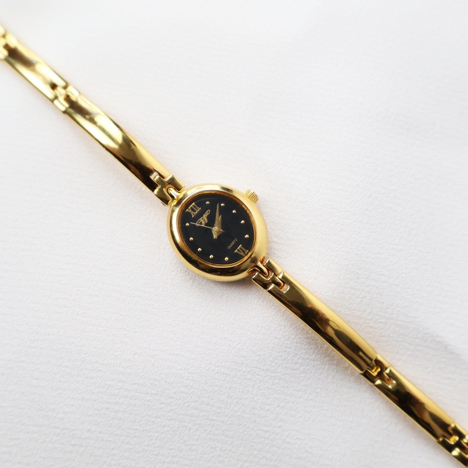 Vintage Black and Gold Worthington Watch