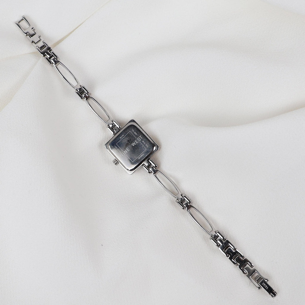 Vintage Silver Nine West Bracelet Watch with Blue Gem Embellishments