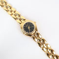 Vintage Black and Gold Worthington Watch with Round Face