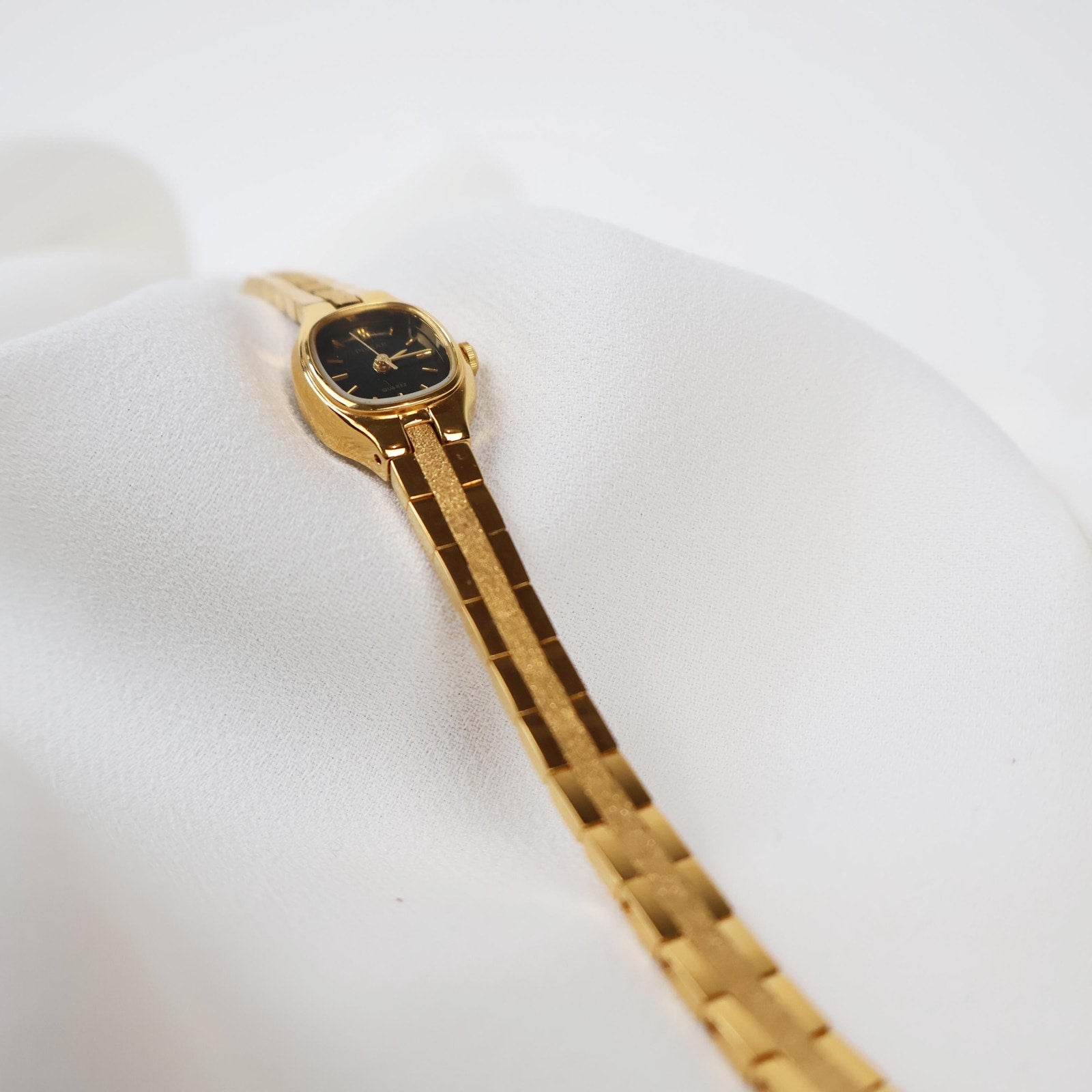 Vintage Black and Gold Pulsar Watch