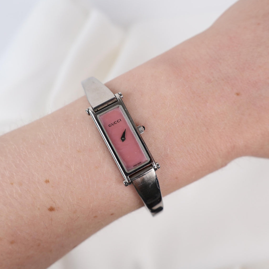 Vintage Silver Gucci Horse-Bit Watch with a Pink Opalesent Face