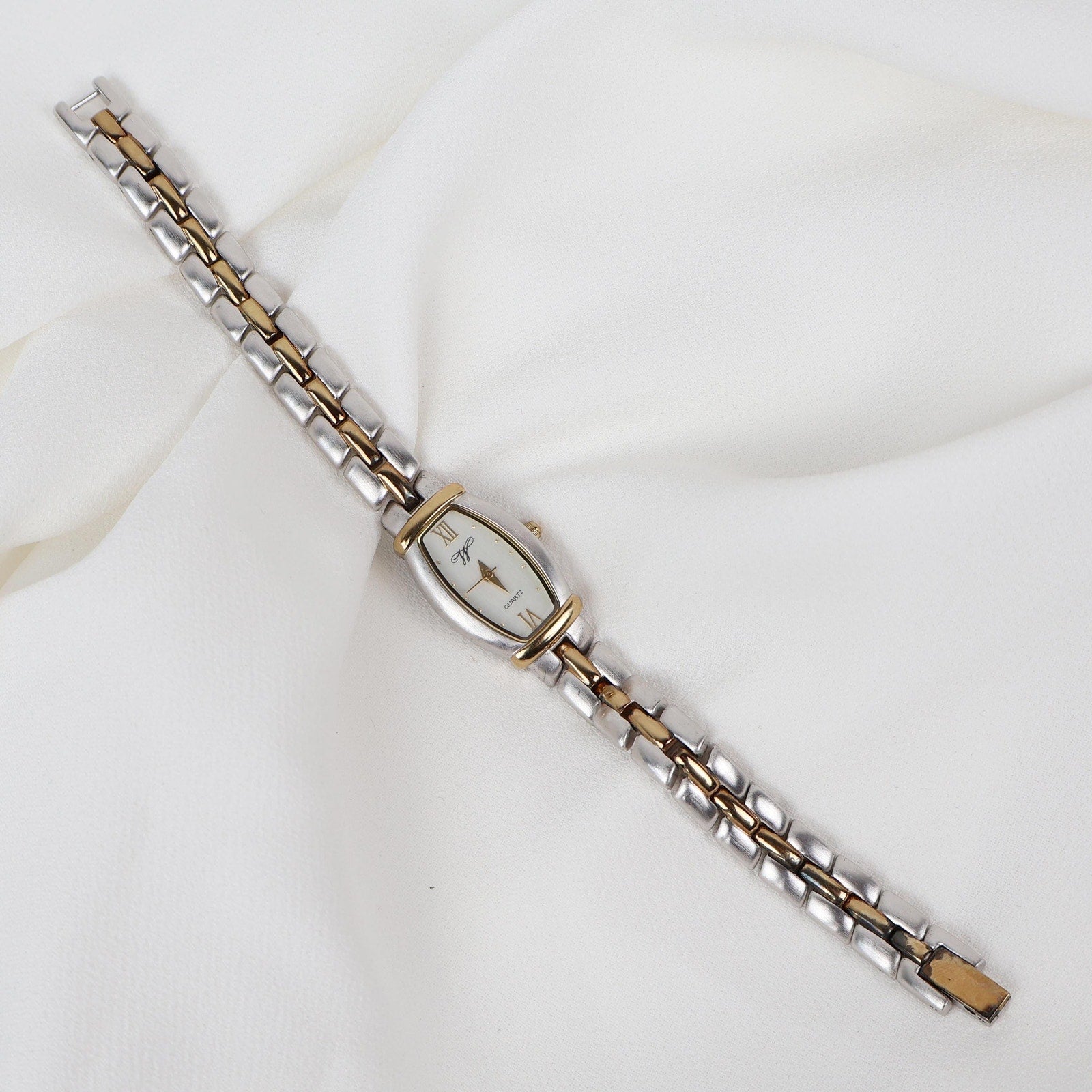 Vintage Two Tone Worthington Watch with a Rectangle/ Oval Face