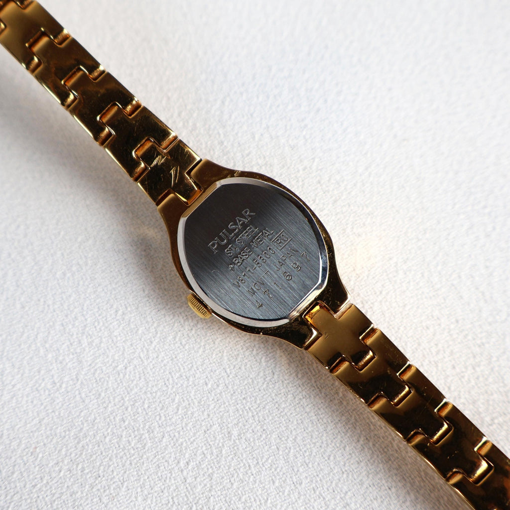 Vintage Black and Gold Pulsar Watch