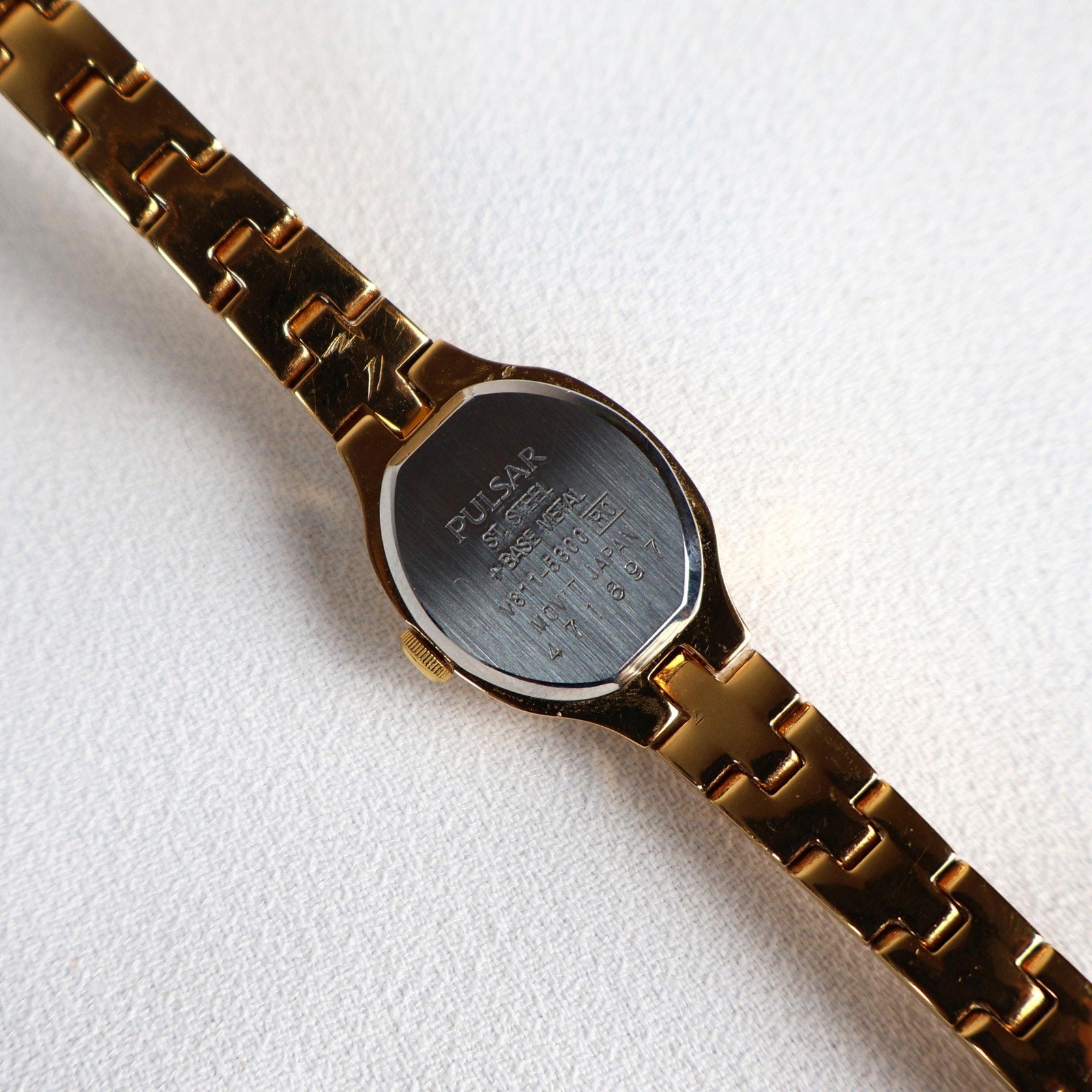 Vintage Black and Gold Pulsar Watch