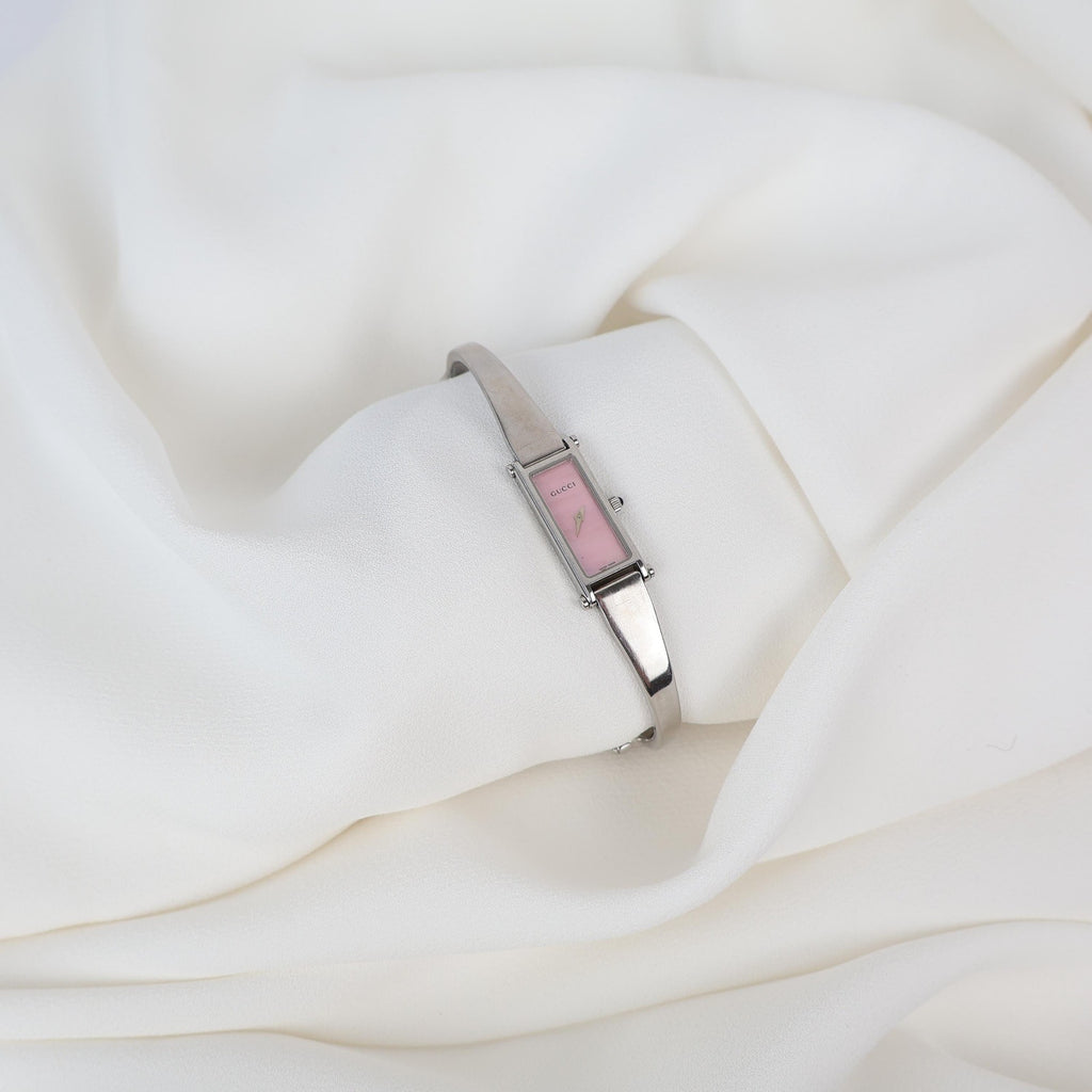 Vintage Silver Gucci Horse-Bit Watch with a Pink Opalesent Face