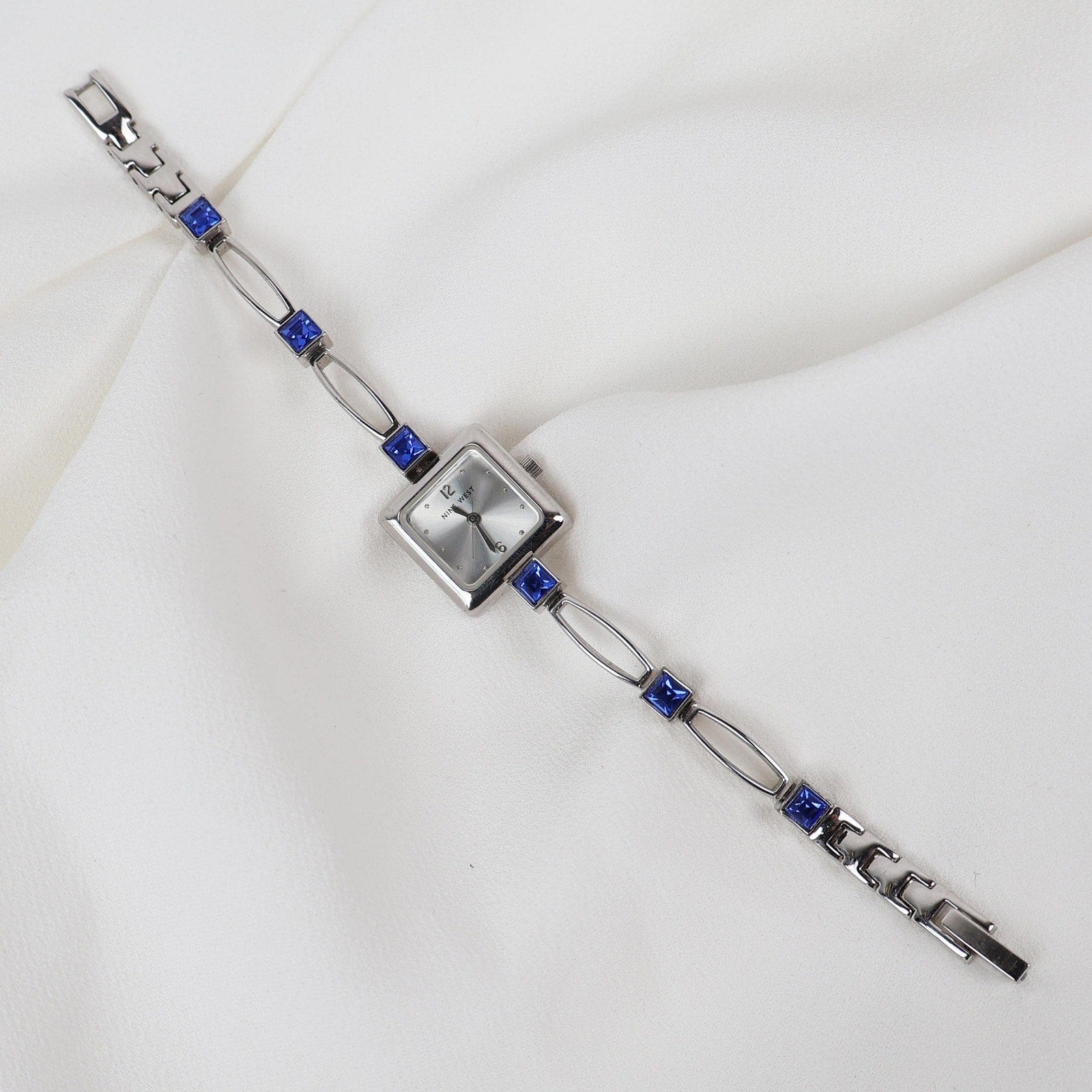 Vintage Silver Nine West Bracelet Watch with Blue Gem Embellishments
