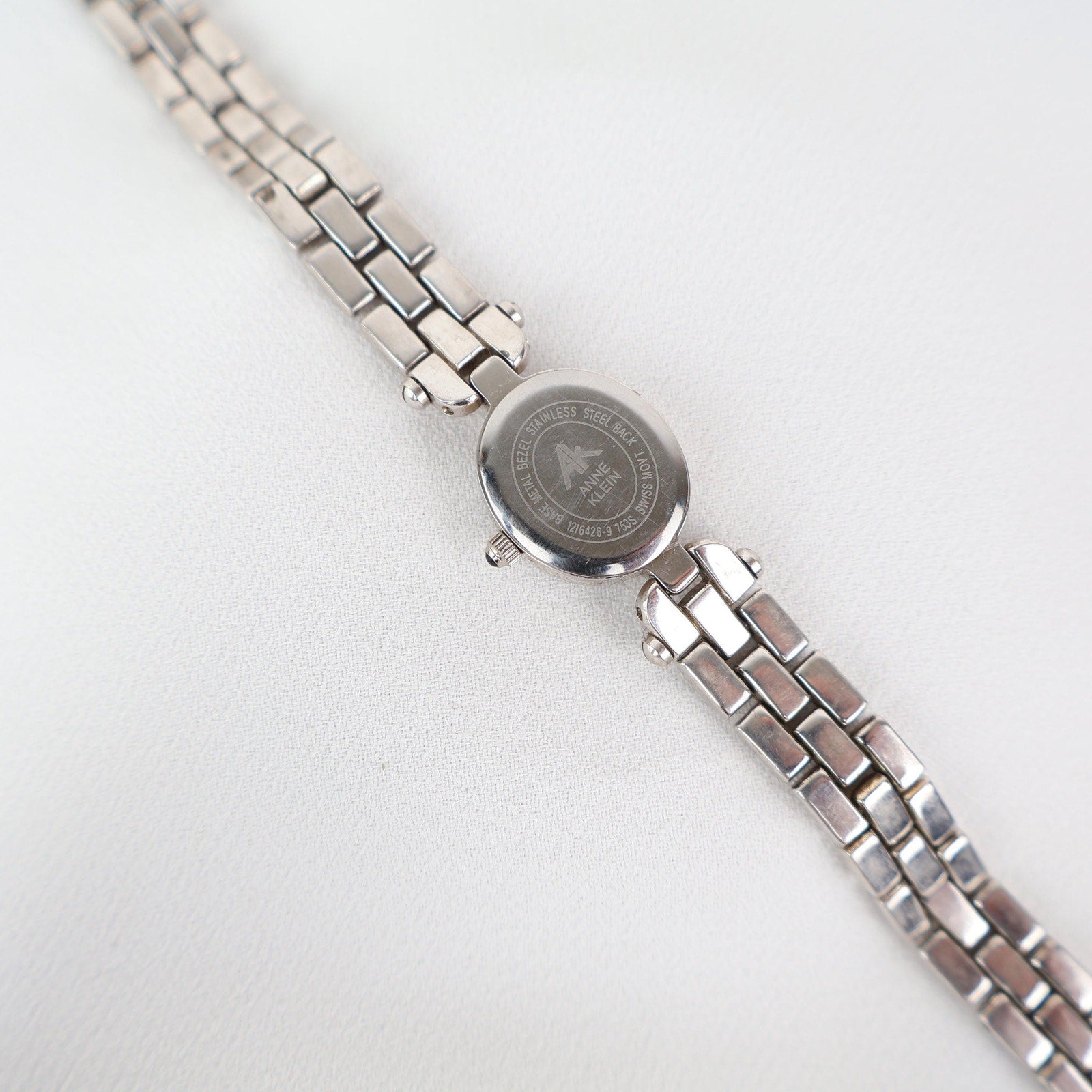 Vintage Silver Anne Klein Watch with an Oval Shaped Face
