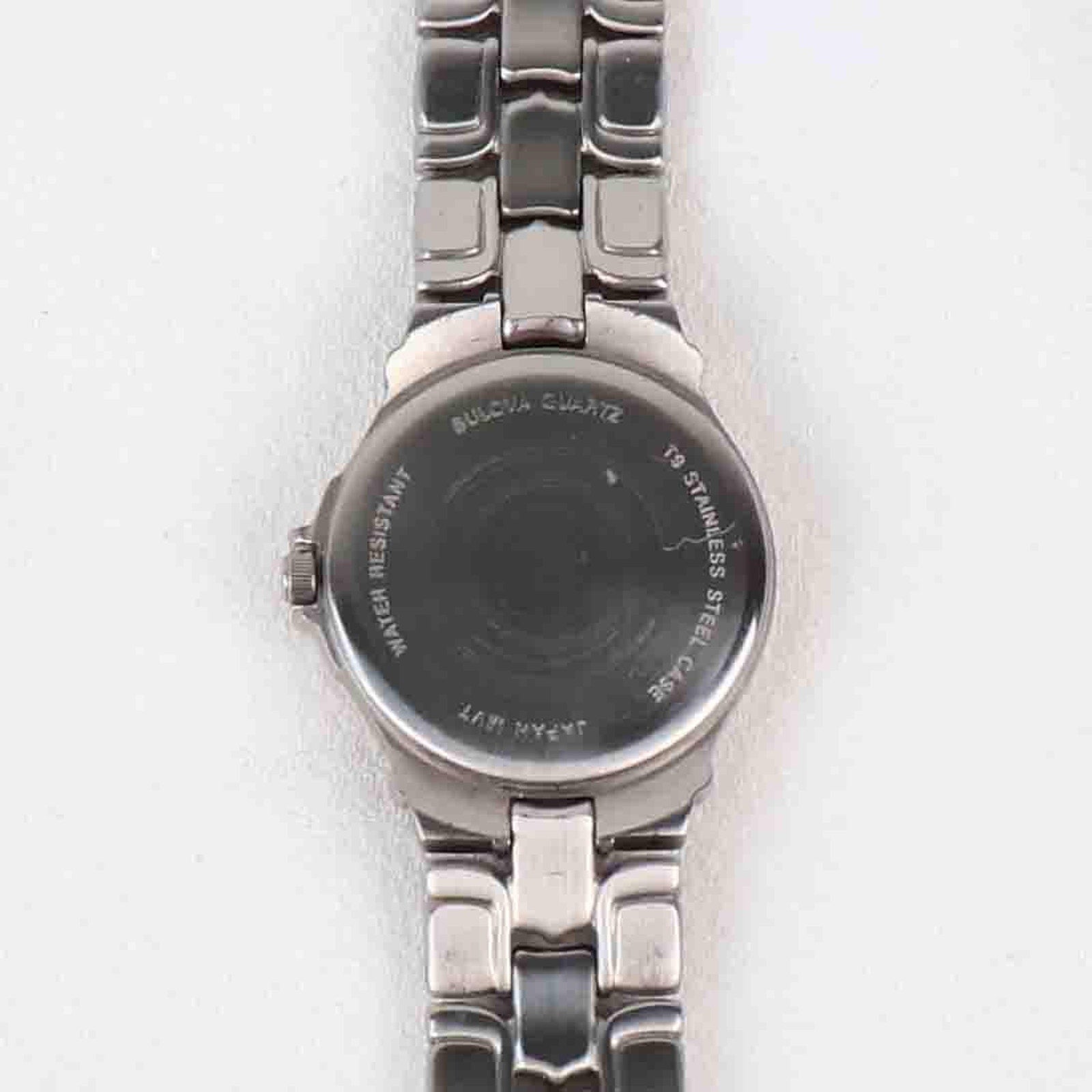 Vintage Silver Tone Bulova Watch with Round Black Watch Face