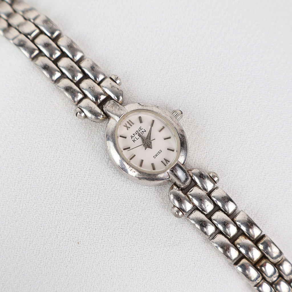 Vintage Silver Anne Klein Watch with an Oval Shaped Face