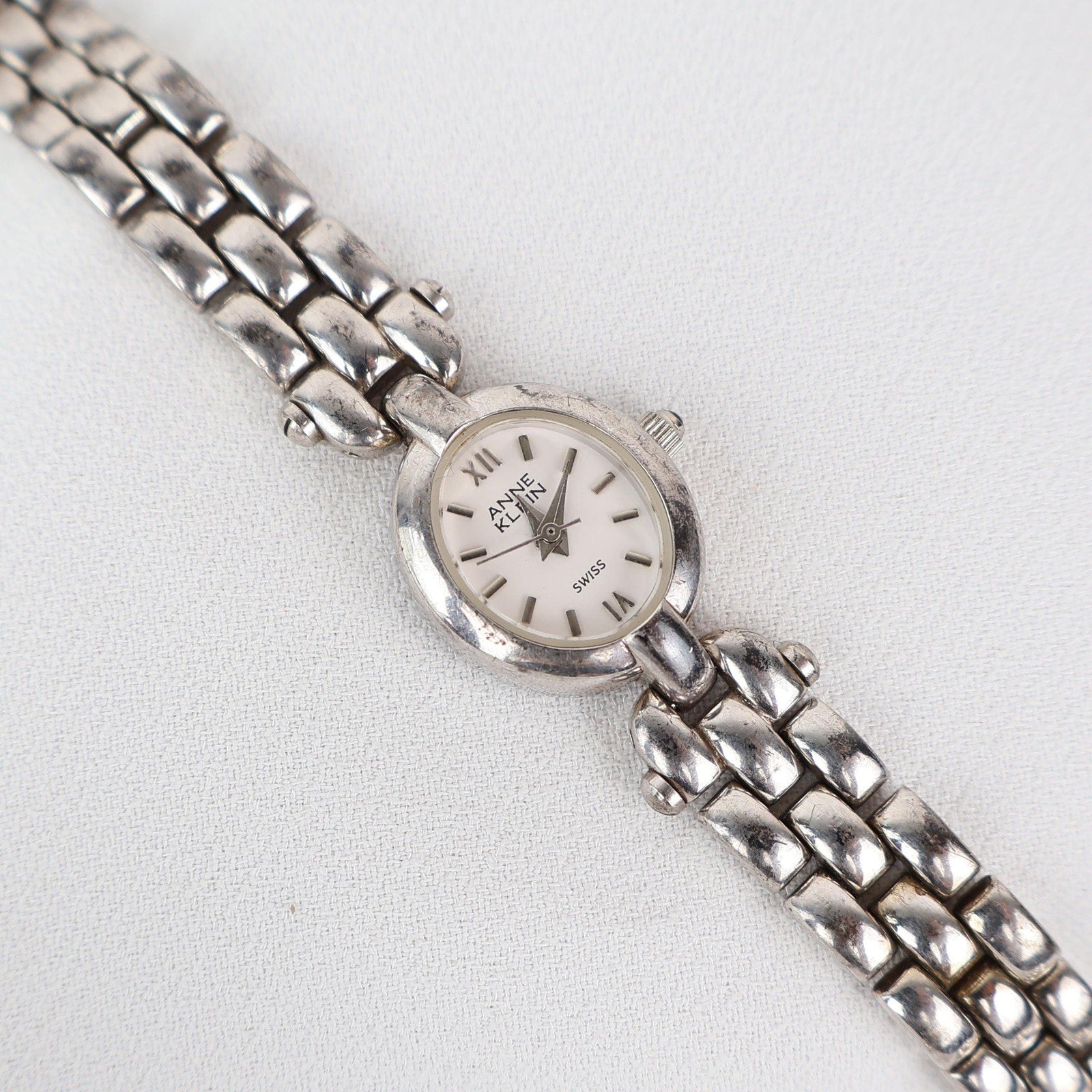 Vintage Silver Anne Klein Watch with an Oval Shaped Face
