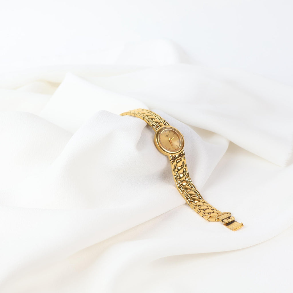 Vintage Gold Tone Pulsar Watch with a Circle Face