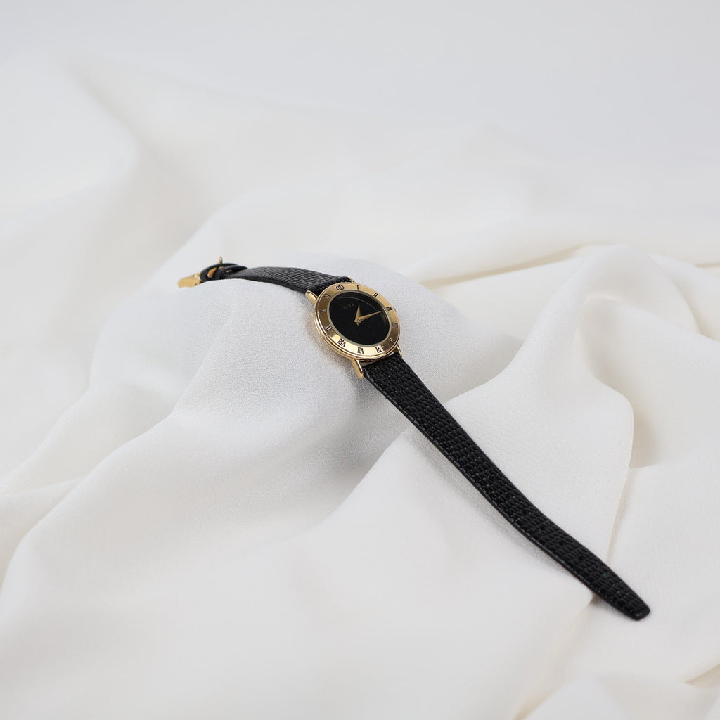 Stunning Vintage Gold Gucci Watch with Black Leather